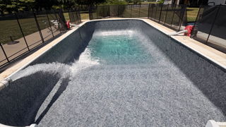 Coastal Pools team replacing a vinyl pool liner in New Castle County