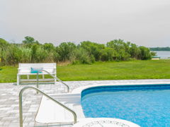 Vinyl liner fitted around pool steps and bench in New Castle County