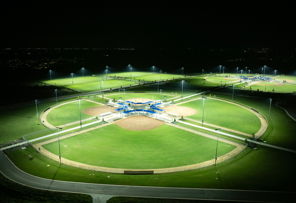 Softball field at Glen Ellyn's Ackerman Park lit at night with Musco LED fixtures