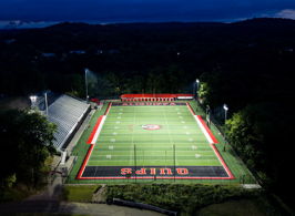 Softball field at Glen Ellyn's Ackerman Park lit at night with Musco LED fixtures
