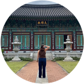 Woman in front of temple