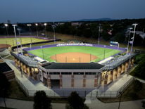 Softball field at Glen Ellyn's Ackerman Park lit at night with Musco LED fixtures