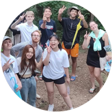 A group of people waving