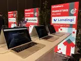 Stoisko Landingi z laptopami, na których działa Lunar