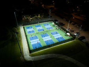 Softball field at Glen Ellyn's Ackerman Park lit at night with Musco LED fixtures