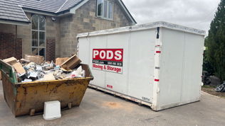 PODS Container on Driveway during extension being built