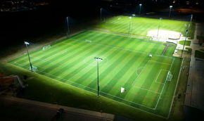 Softball field at Glen Ellyn's Ackerman Park lit at night with Musco LED fixtures