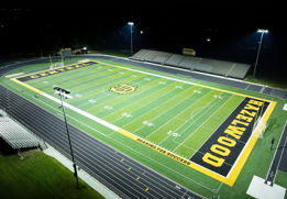 Softball field at Glen Ellyn's Ackerman Park lit at night with Musco LED fixtures