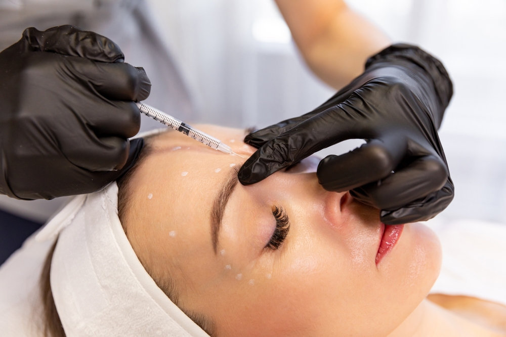 Clinician performing an injectable facial treatment