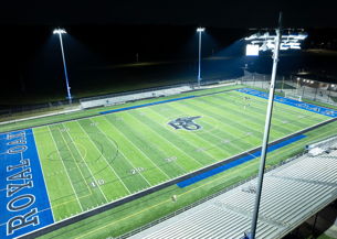 Softball field at Glen Ellyn's Ackerman Park lit at night with Musco LED fixtures