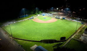 Softball field at Glen Ellyn's Ackerman Park lit at night with Musco LED fixtures