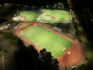 Softball field at Glen Ellyn's Ackerman Park lit at night with Musco LED fixtures
