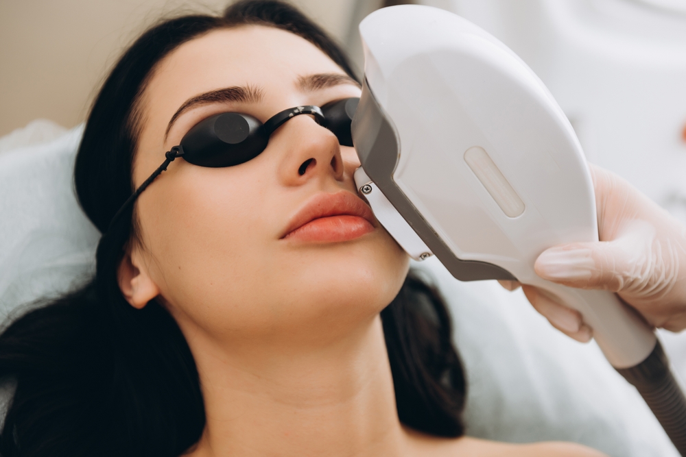 Laser device treatment with protective eyewear
